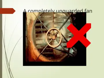 Slide 21: A completely unguarded fan blade and pulley